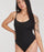 woman wearing a black swimsuit