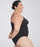 woman wearing a black swimsuit