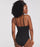 woman wearing a black swimsuit