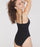 woman wearing a black swimsuit