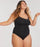 woman wearing a black swimsuit