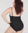 woman wearing a black swimsuit