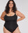 woman wearing a black swimsuit